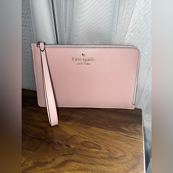 kate spade Handbags - Kate Spade New York Staci Medium L Zip Wristlet. Light pink. Brand new!